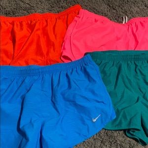 4 Nike running shorts